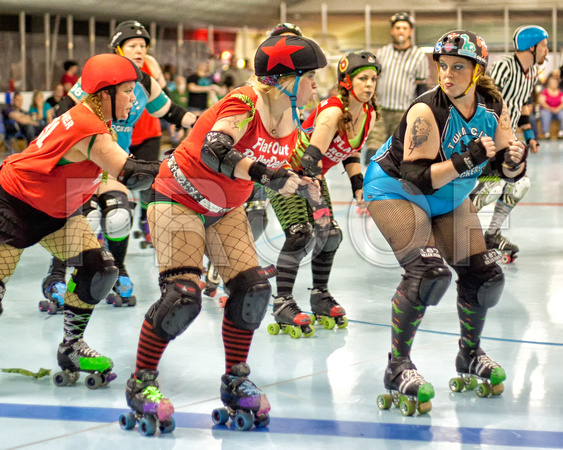 Colorfully Dressed In Both Expression And Attire, Roller Derby Woman, "Breasaurus" Of The Twin City Knockers Prepares To Block in this dramatic event photograph by Brian Buckner Photography.