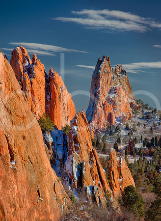 Winter Snow Clings To Red Rock Spires As Late Afternoon Sun Sets The Red Rocks On Fire With A Rich, Warm Glow  In This Commercial Landscape Photograph By Brian Buckner Photography.
