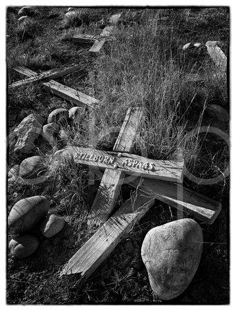 The Grave Of A Stillborn Child Lies Forgotten And In Disrepair At An Abandoned Mission Cemetery In This Evocative Black and White Photograph By Brian Buckner Photography, Shreveport, Louisiana.