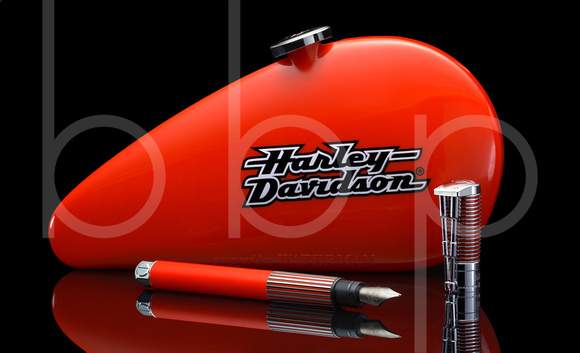 Harley Davidson Fountain pen is a image that shows a gas tank shaped case and the harley davidson pen it holds in this commercial product advertising photograph by Brian Buckner Photography, Shrevport