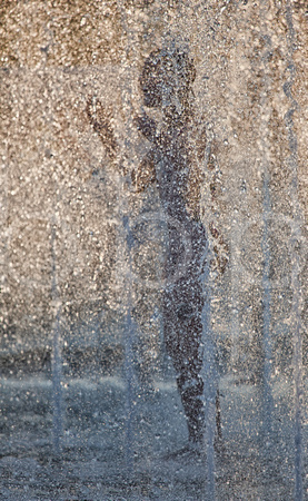 A Silhouetted Child Plays And Splashes In A Cities Water Park Fountain Enjoying Summertime Fun In This Commercial Artistic Photograph Of A City Scene By Brian Buckner Photography, Shreveport.