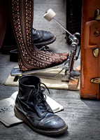 A New Orleans Female Street Musician Wearing Fishnet Hose Uses Her Suitcase As A Bass Drum While Creating Jazz Music On Bourbon Street In This Photograph By Brian Buckner Photography.