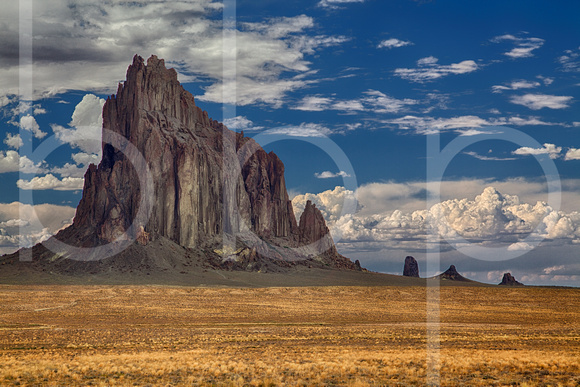 Shiprock Is A Volcanic Cinder Cone Rising 1,583 Feet Above The High-Desert Plain On The Navajo Nation Reservation In New Mexico  In This Commercial Landscape Photograph By Brian Buckner Photography.