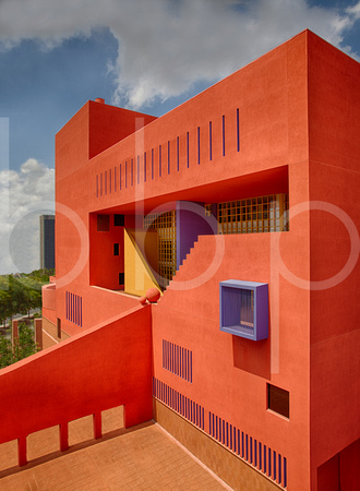 The San Antonio Central Library Is Captured In It's "Enchilada Red" Glory showing Various Geometric Shapes in this Commercial Architectural Photograph By Brian Buckner Photography, Shreveport.